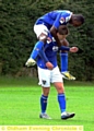 TREBLE TOP . . . Danny Philliskirk celebrates the first of his three goals for the reserves with Glenn Belezika. 
