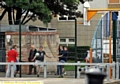 YOUTHS hanging out at the outdoor play area in Newbury Walk, Chadderton  

