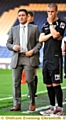 FOOD FOR THOUGHT . . . manager Lee Johnson and first-team coach Paul Murray look on as Athletic strive to find a way through the Derby County back line. 
