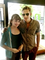April Whittle (14) with 'Blue' band member Lee Ryan in Nosh sandwich bar, Yorkshire Street in Oldham. 
