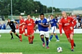 KOREY Smith (centre) chases down the ball in the recent Curzon Ashton friendly. 