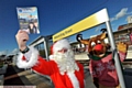 ON THEIR WAY: Rodney Reindeer and Santa launch Oldham's Christmas events this weekend.