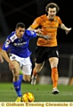 DIRECT ROUTE: Jonson Clarke-Harris heads for goal.  