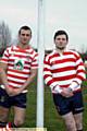 Old and new: skipper Lewis Palfrey (left) shows off the Oldham RL kit for this season — and Michael Ward shows off the more familiar shirt of past Oldham sides 