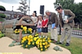 Judges Roger Burnett (right) and Jim Buttress at the underwater themed legacy bed at Broadway junction on Rochdale Road. Children from St Anne's School in Royton helped plant some of the flowers. From the left: Teigan Wheeler, Heidi Burton and Ashleigh Bowskill.