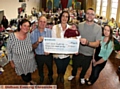 CARING in Lisa’s memory: from left, fundraiser Sarah Limb, Lisa’s father Robert, Lisa’s suster Ally Ziemniak with Zac, Aaron Ziemniak and Karen Jones of Kit4Kids