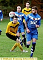 ON THE RIGHT TRACK: Diggle are going well in the Huddersfield League top flight. Gareth Chew (right) is shown in full flow against Netherton.