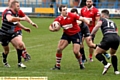 WATCH OUT . . . Oldham’s Phil Joy looks for a gap against the Broncos.