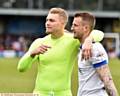 
HEADING BACK TO OLDHAM? . . . new Burton Albion capture Connor Ripley with Peter Clarke after Athletic's draw at Wimbledon last season