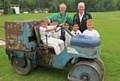 FUND-RAISERS . . . Neil Williams (right) and Gordon Whitehead with a clutch of junior players on the old roller at Glodwick Cricket Club