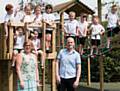 FIR Bank Primary School head teacher Hazel MacKay and Tom Biggs, from Creative Play, pictured with children from the school council who helped design the new play area