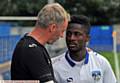 NOW HEAR THIS . . . manager John Sheridan talks to Enoch Andoh before last night's match. PICTURES by ANTHONY MILLER