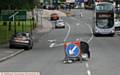 CENTRE OF ATTENTION . . . Manhole cover works on Ripponden Road, Littlemoor, Oldham
