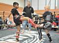 FRONT FOOT . . . Hashir Tariq (10) of Team Taz (left) takes on Leighton Hilsley (8) of Kearsley Thai