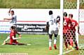 SHOOT ON SIGHT . . . Courtney Duffus' strike on goal is handled on the goal-line for an Athletic penalty