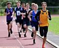 HITTING THE FRONT . . . eventual winner Jamie Smith (Crompton House) leads the Year 10 1500m final
