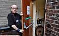 MANAGER Brian Lever shows the back door where the thieves entered the Animal Rescue shop for a second time