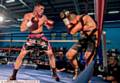 ON THE FRONT FOOT . . . Mark Heffron (left) pins Istvan Zeller against the ropes