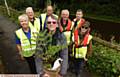 DR Gough with Canal & River Trust officials and Street Scene Greenfield volunteers