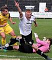 IT'S THERE . . . Adam Latham celebrates putting Mossley ahead.