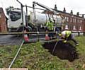 Sink hole on Acre Lane, Derker. Council workers establish it is likely to be a mains collapse and therefore United Utilities' responsibility.