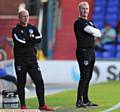 FINE margins . . . Athletic manager John Sheridan (right) and assistant manager Tommy Wright