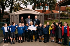 Pictured with school pupils are (left to right): Tiffany Chevis, Marketing Executive, Simple Life, Ian Mason, Headteacher, Mills Hill Primary School and Matthew Townson, Development Director, Simple Life.
