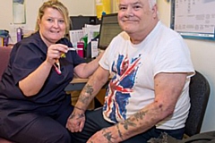 Irene Shepherd is pictured with pensioner David Ashley