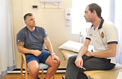Barrie McDermott is pictured with Senior Physiotherapist Rob Conlon, who features in the videos