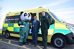 North West Ambulance Charity development manager, Vincent Sherard-Bornshin (centre), with Pandamedic (left) and David McNally, Community Engagement and Resuscitation Manager at North West Ambulance Service