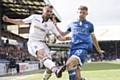 Jamie Stott (right) in action for Athletic during last season's victory against Bolton at Boundary Park