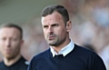 Athletic manager Richie Wellens on the touchline at the Sixfields Stadium