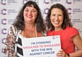 Debbie Abrahams, MP for Oldham East and Saddleworth, along with Cancer Campaigns Ambassador and constituent Dr Nicola Jeffery-Sykes, from Uppermill. They pledged to stand ‘shoulder to shoulder’ with the NHS against cancer at the Westminster launch of Cancer Research UK’s new campaign