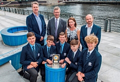 Saddleworth School students with their Clean Air Day competition winners’ award and (back, left-to-right) Mark Matthews of Collaborate Digital, TfGM Customer Director Stephen Rhodes, Saddleworth School Community and Operations Manager Angela Reece and Head of Media Studies Nik Jackson