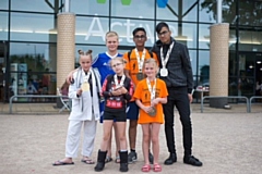 Stealth Brazilian Jiu-Jitsu Youth team members show off their silverware