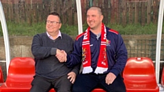 In the Vestacare Stadium hot-seat for the first time . . . Matt Diskin (right) with club chairman Chris Hamilton.