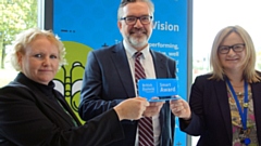 Helen Boden, CEO of the British Dyslexia Association, presenting the Smart Award to Oldham College’s Alun Francis (Principal and Chief Executive) and Liz Wilcox 