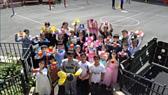 Pupils at Alexandra Park School with some of their 'Bee' Peace work models