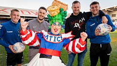 Dame Dotty Trott with Latics players