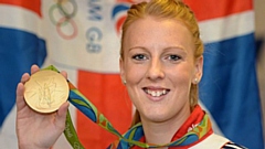 Oldham-born Nicola White shows off her Olympic gold medal