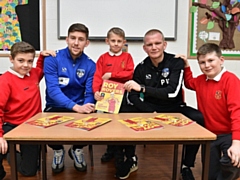 Callum Lang and Pete Wild, with the comics and Oldham schoolkids