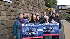 Debbie Abrahams and supporters seen here at one of her many campaigning visits to Greenfield station in recent years.
 
