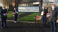 Critical Care Lead Nurse Helen Barrow and Senior Sister Maria Daynes receive kind gifts from Andrew Bagley and Andrew Rothwell of Saddleworth Round Table