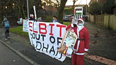 Protesters gathered outside the factory on Greenacres Road, Waterhead