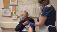 Alan Thomas was the first person over 80 in the borough to have the vaccination, with Dr Hunjan administering his vaccine.