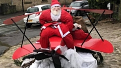 The amusing Santa has appeared outside the Junction Inn at Denshaw