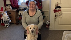 Marie Howarth is pictured with her beautiful guide dog Bertie