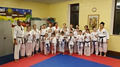 The successful Kenny Karate students are pictured with their certificates