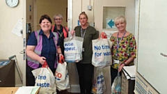 Rose Knipe is pictured with her kind-hearted Tesco colleagues