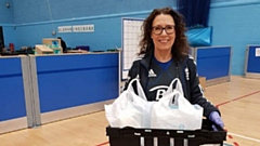 MP Debbie Abrahams volunteering at the temporary home of Oldham Foodbank, now located at the leisure centre